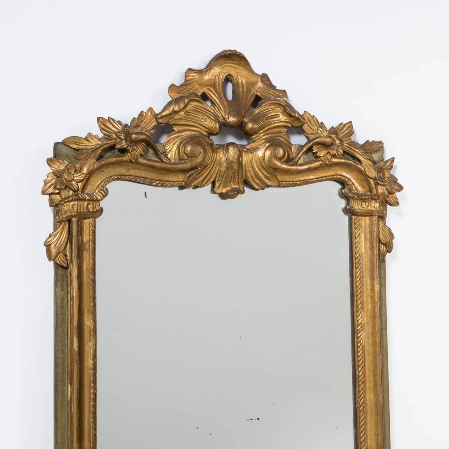 Antique flowered mirror from the 19th century.