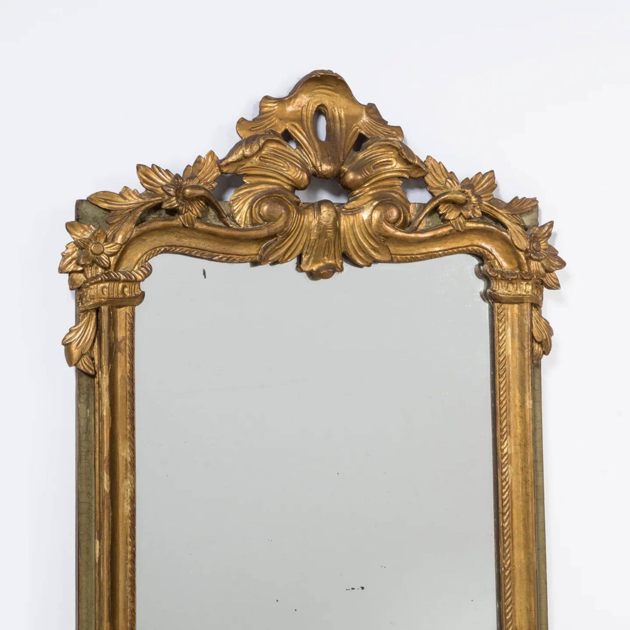 Antique flowered mirror from the 19th century.