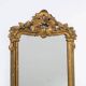 Antique flowered mirror from the 19th century.