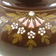 Late 19th century flooring on a brown flower-decorated background