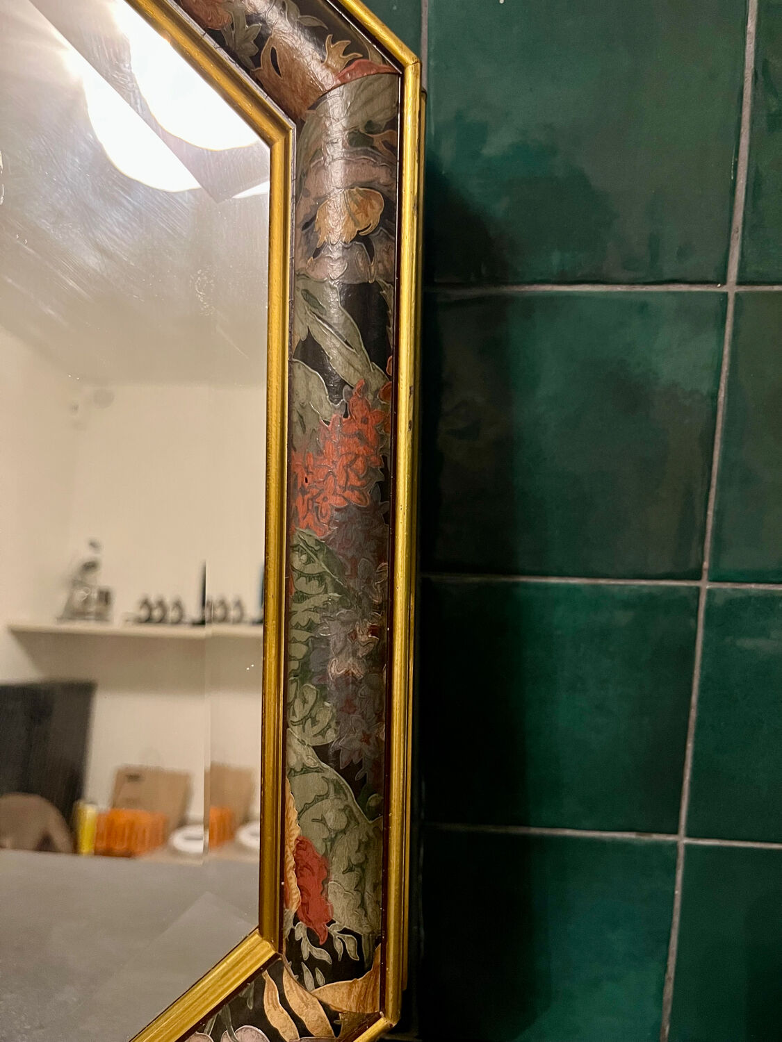 Vintage beveled mirror with floral frame