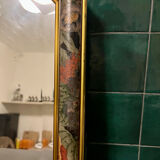 Vintage beveled mirror with floral frame