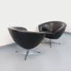 Pair of vintage Scandinavian swivel armchairs in faux leather and chrome.