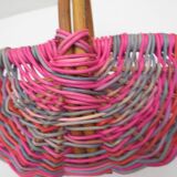 Small multi-colored wicker basket for children