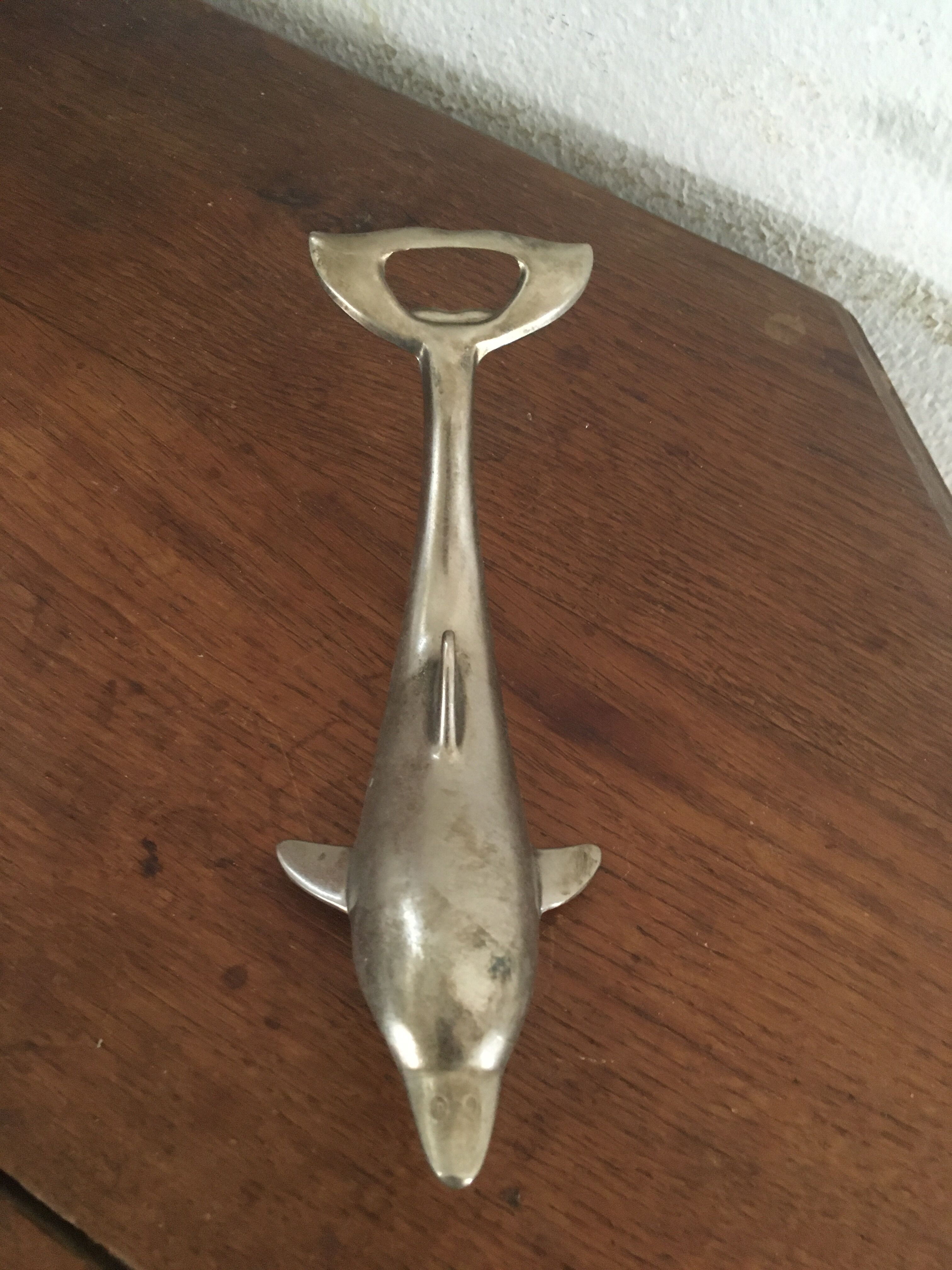Dolphin-shaped bottle opener