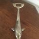 Dolphin-shaped bottle opener