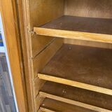 1950s oak office storage cabinet with curtains.