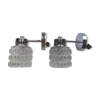 Stainless steel wall sconces and 70s glasses