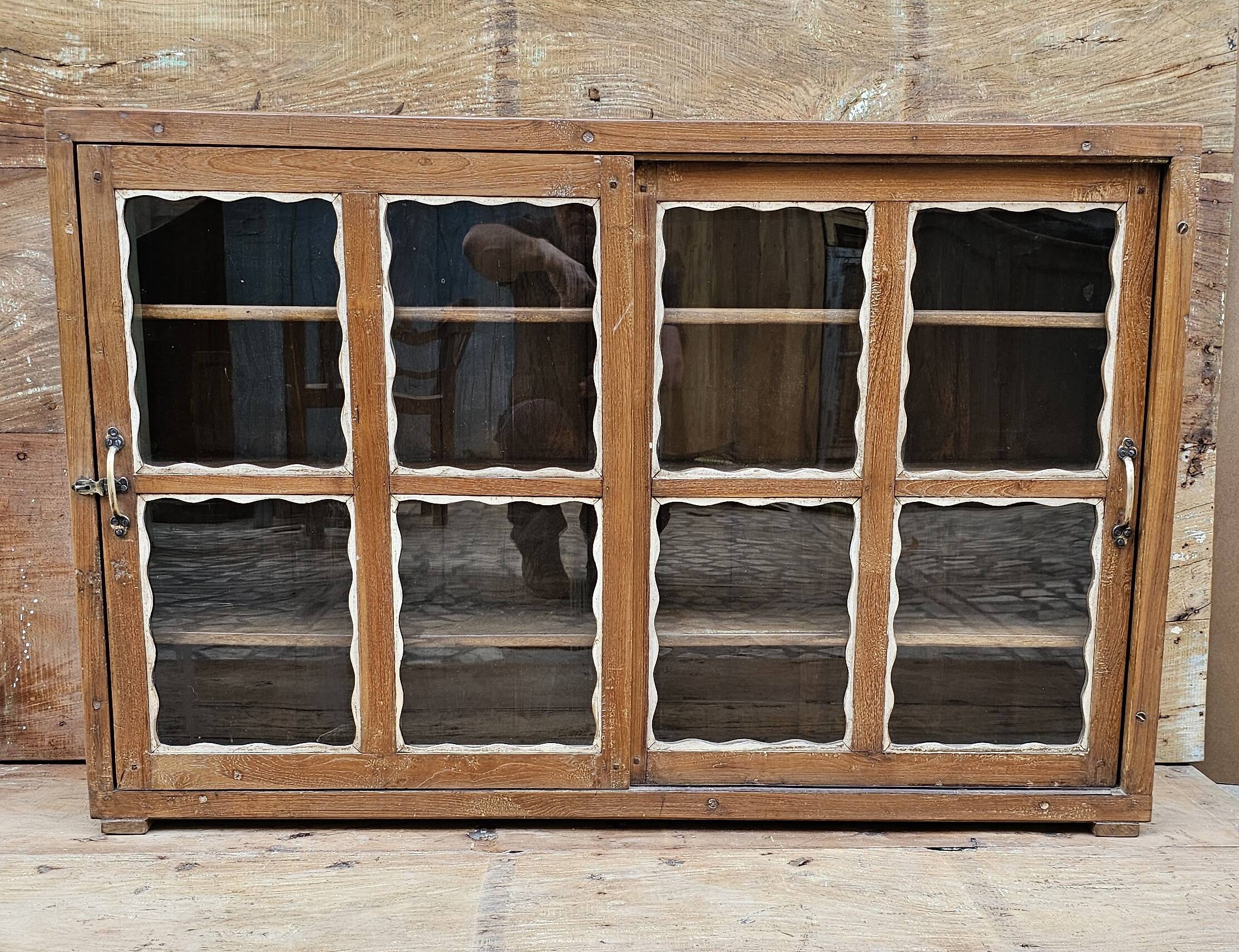 Antique Art Deco glass-fronted sideboard in Burmese teak