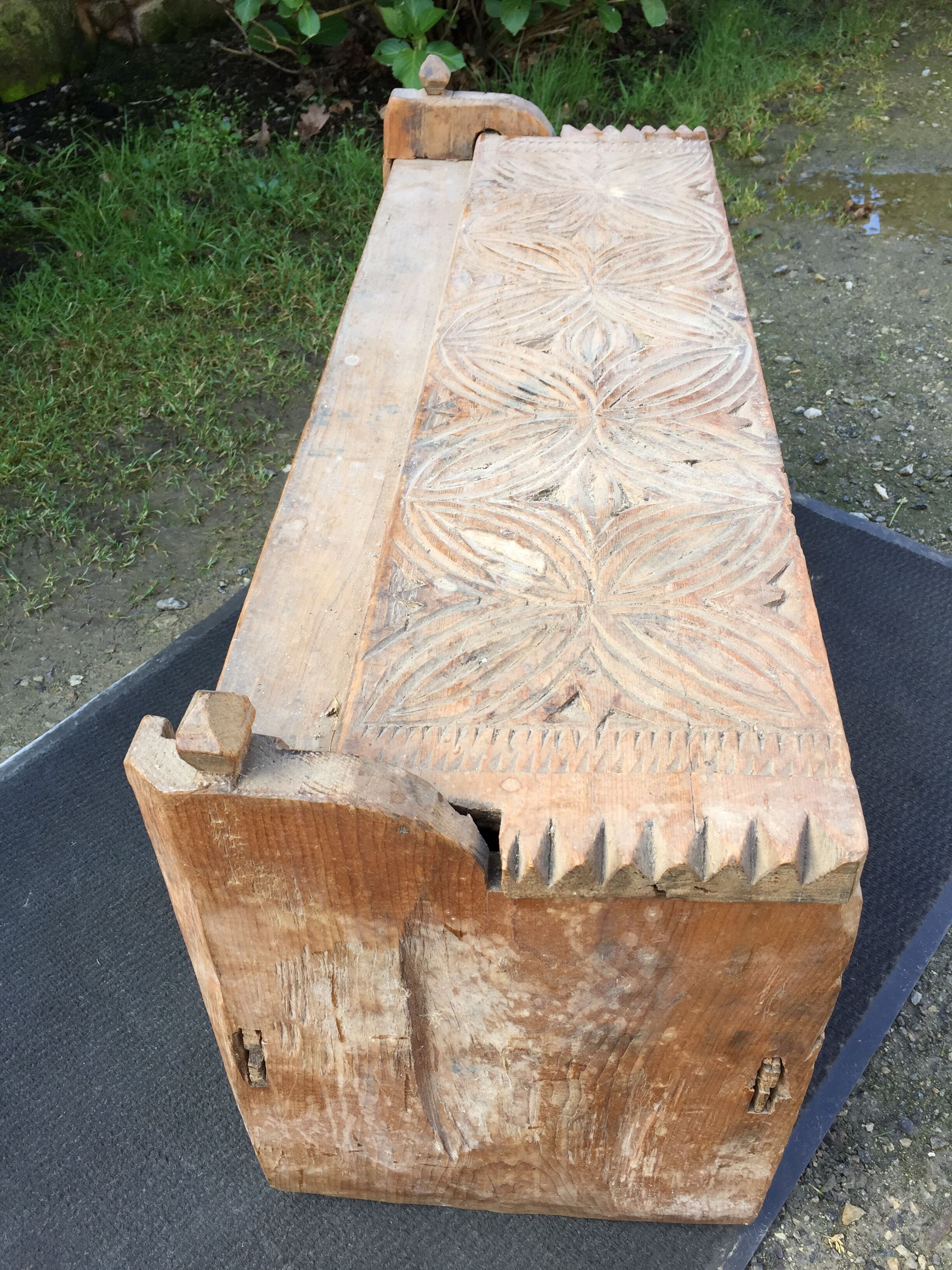 Ancient brutalist chest carved wind rose
