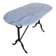 Cast iron bistro table and old oval marble top