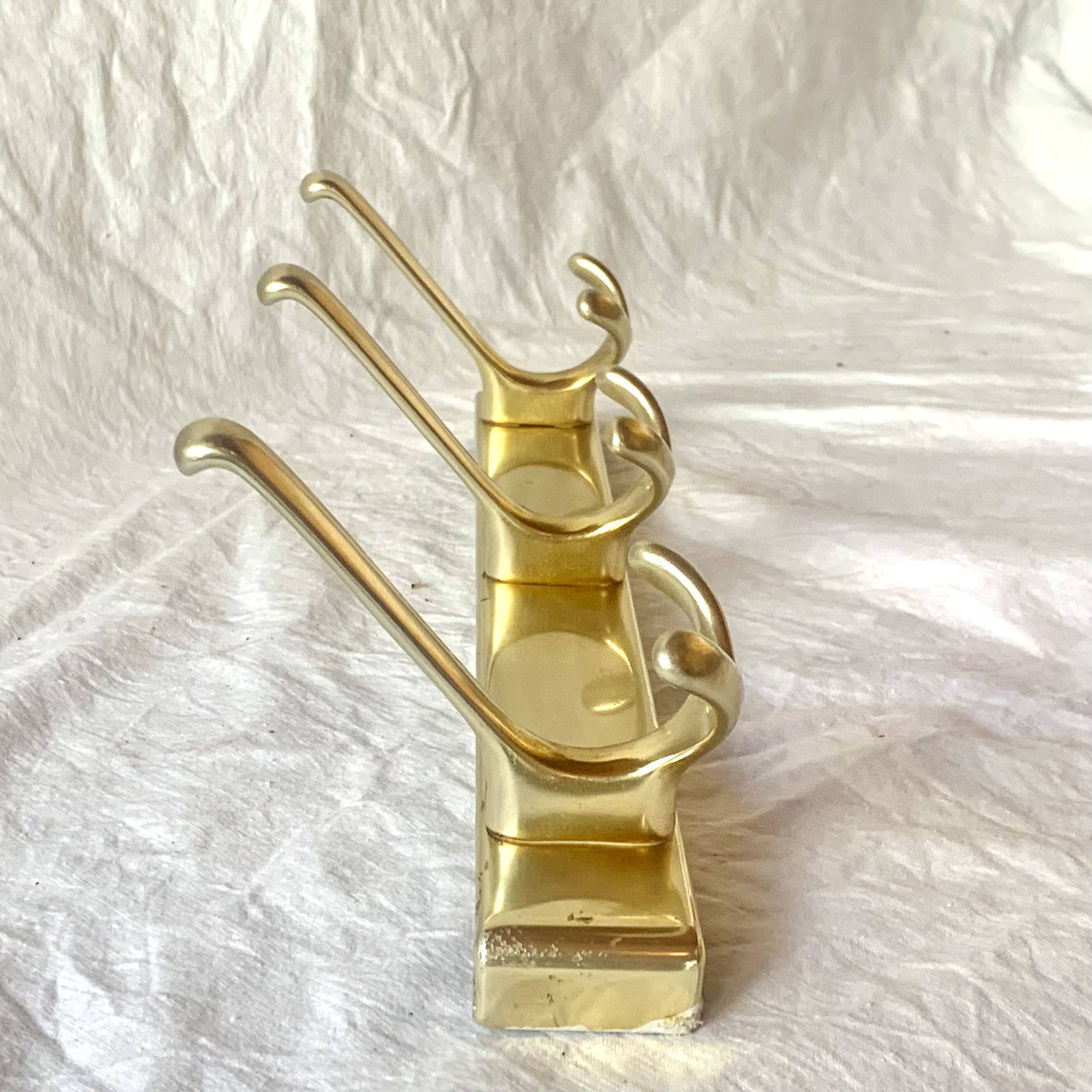 Vintage gold aluminum coat rack with three hooks