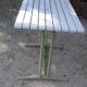 Old garden table with iron slats