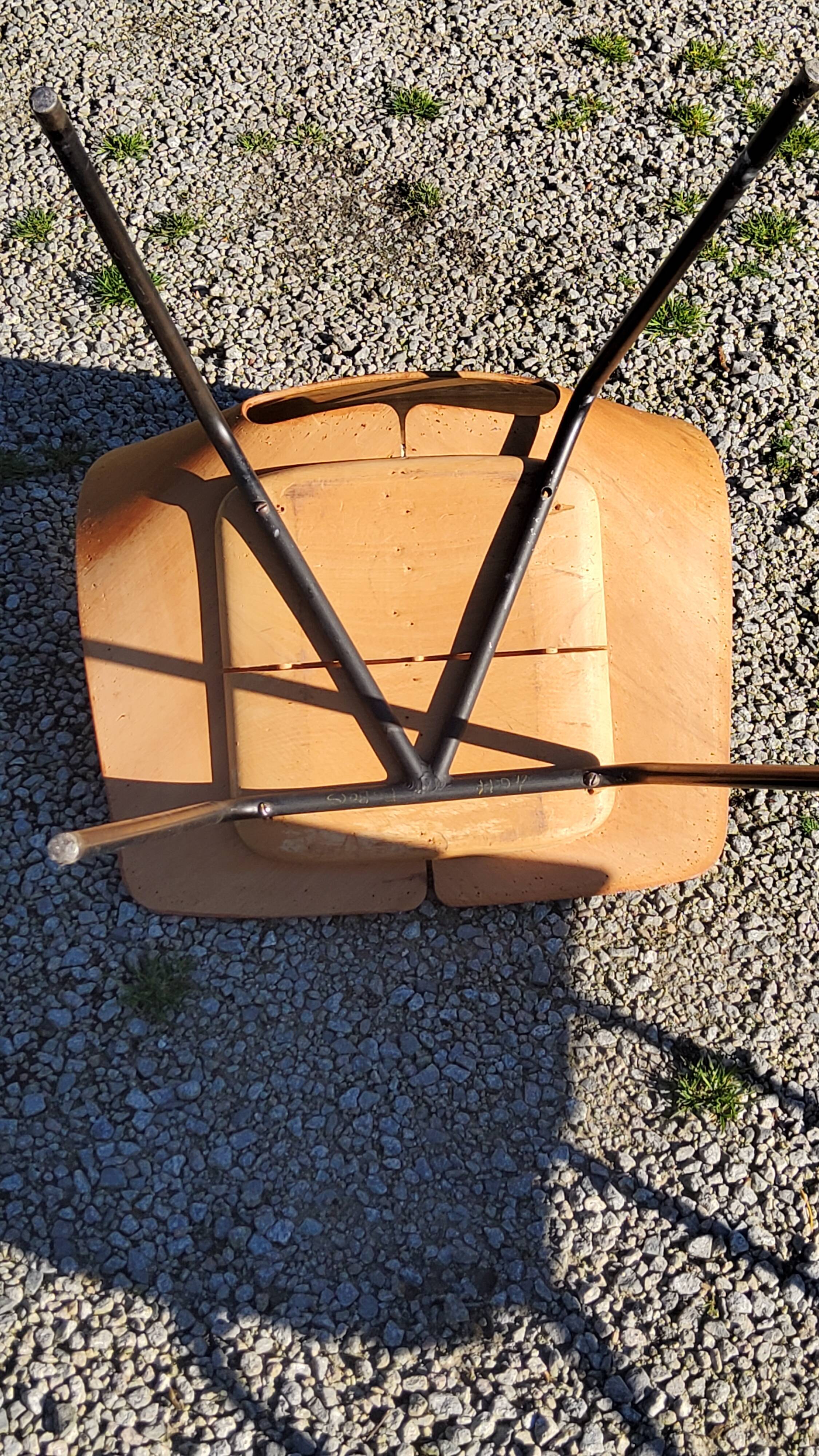 Pair of tonneau chairs by Pierre Guariche plywood base tubes 1954