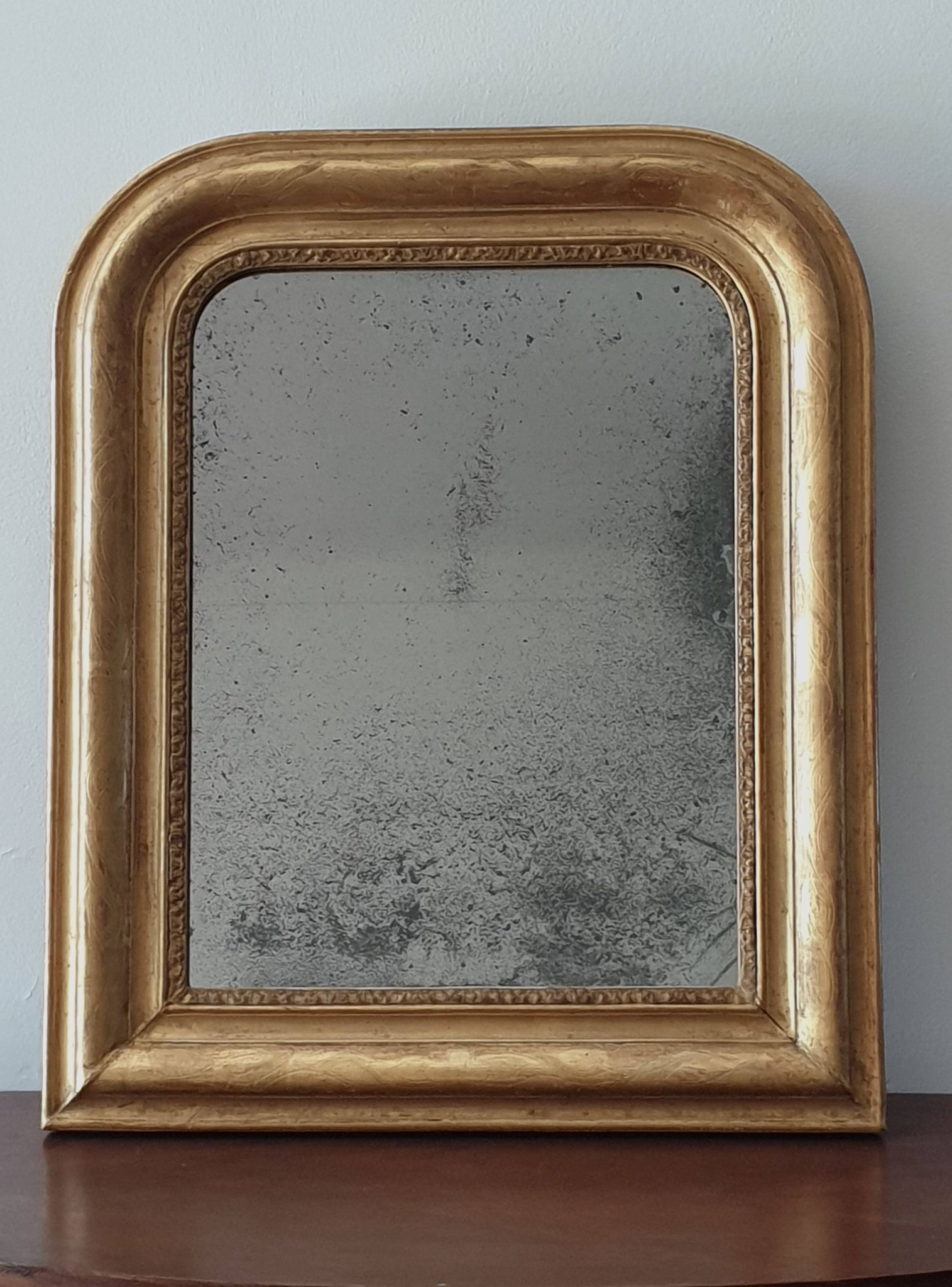 Old gilded mirror and old mercury glass - wall mirror with gold leaf