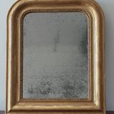 Old gilded mirror and old mercury glass - wall mirror with gold leaf