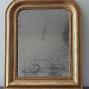 Old gilded mirror and old mercury glass - wall mirror with gold leaf