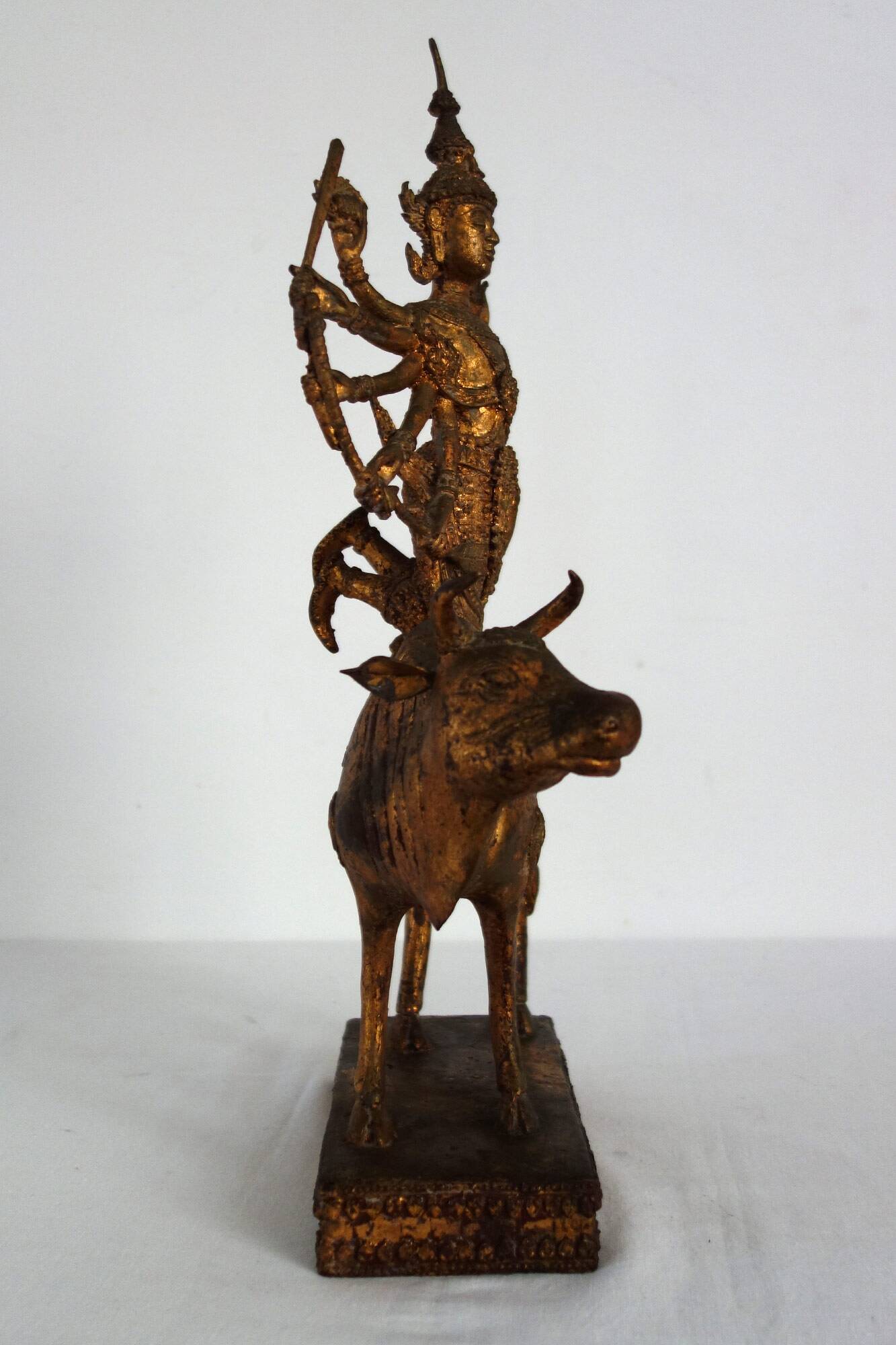 Golden bronze statue of Shiva on Nandi, India, mid-20th century.