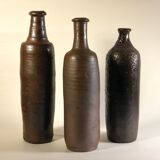 Lot de trois bouteilles anciennes en grès