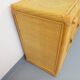Vintage storage unit in rattan and woven rattan from the 1970s.