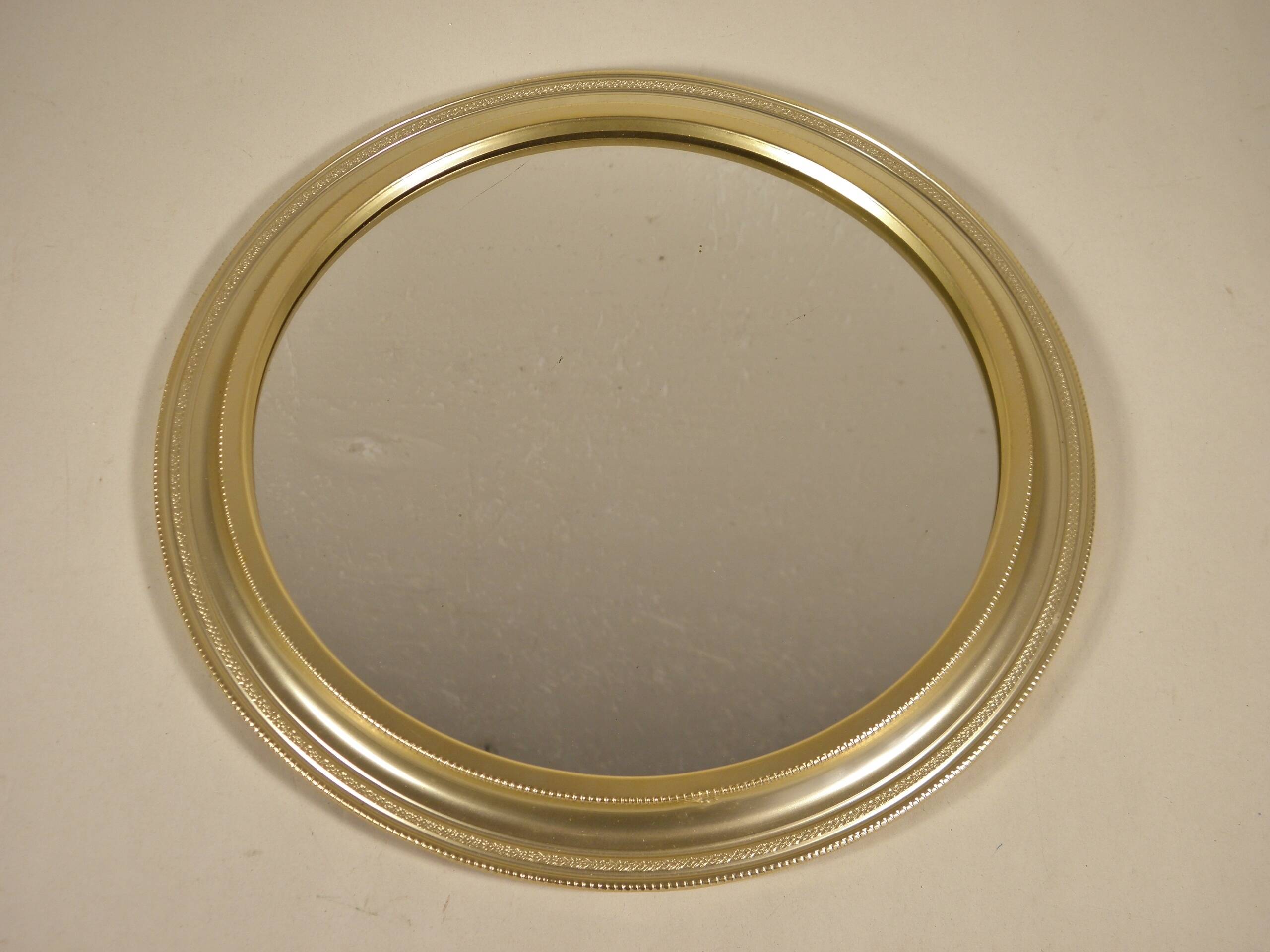 Round mirror in gilded metal 24 cm