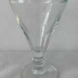 4 glasses of moulded pressed glass wine on foot