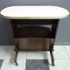Pink formica magazine table 1950s