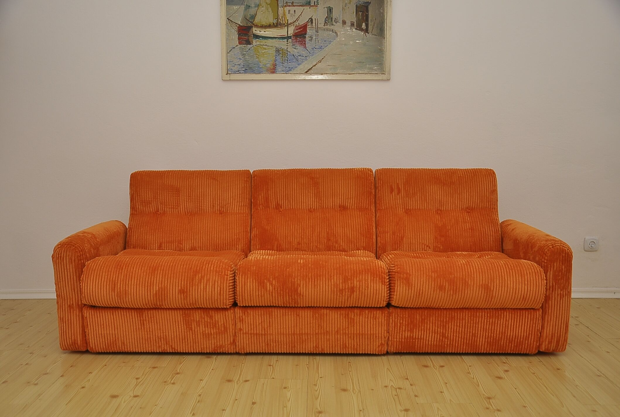 Orange corduroy modular sofa, 1970s.