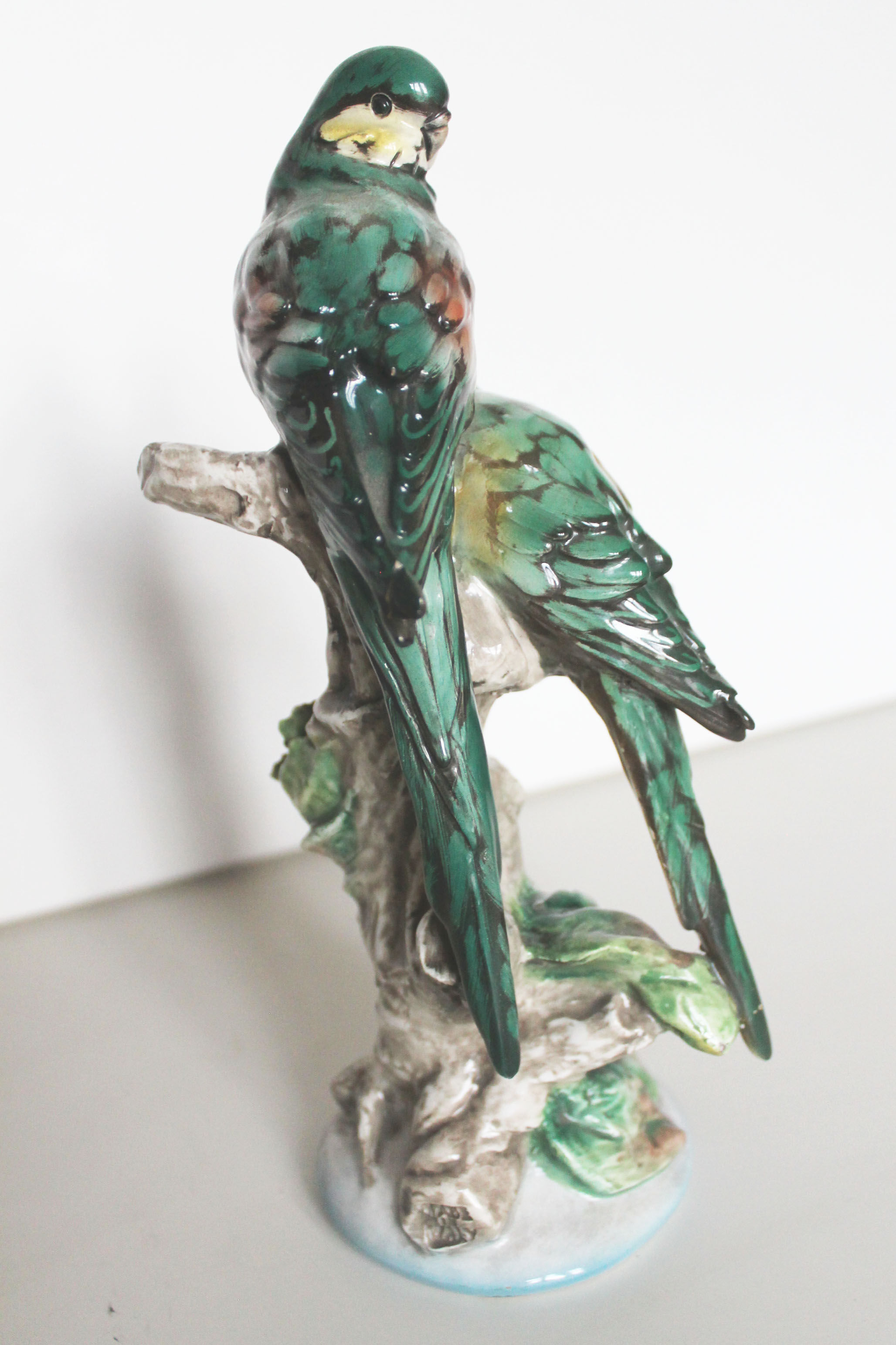 Couple of ceramic parakeets