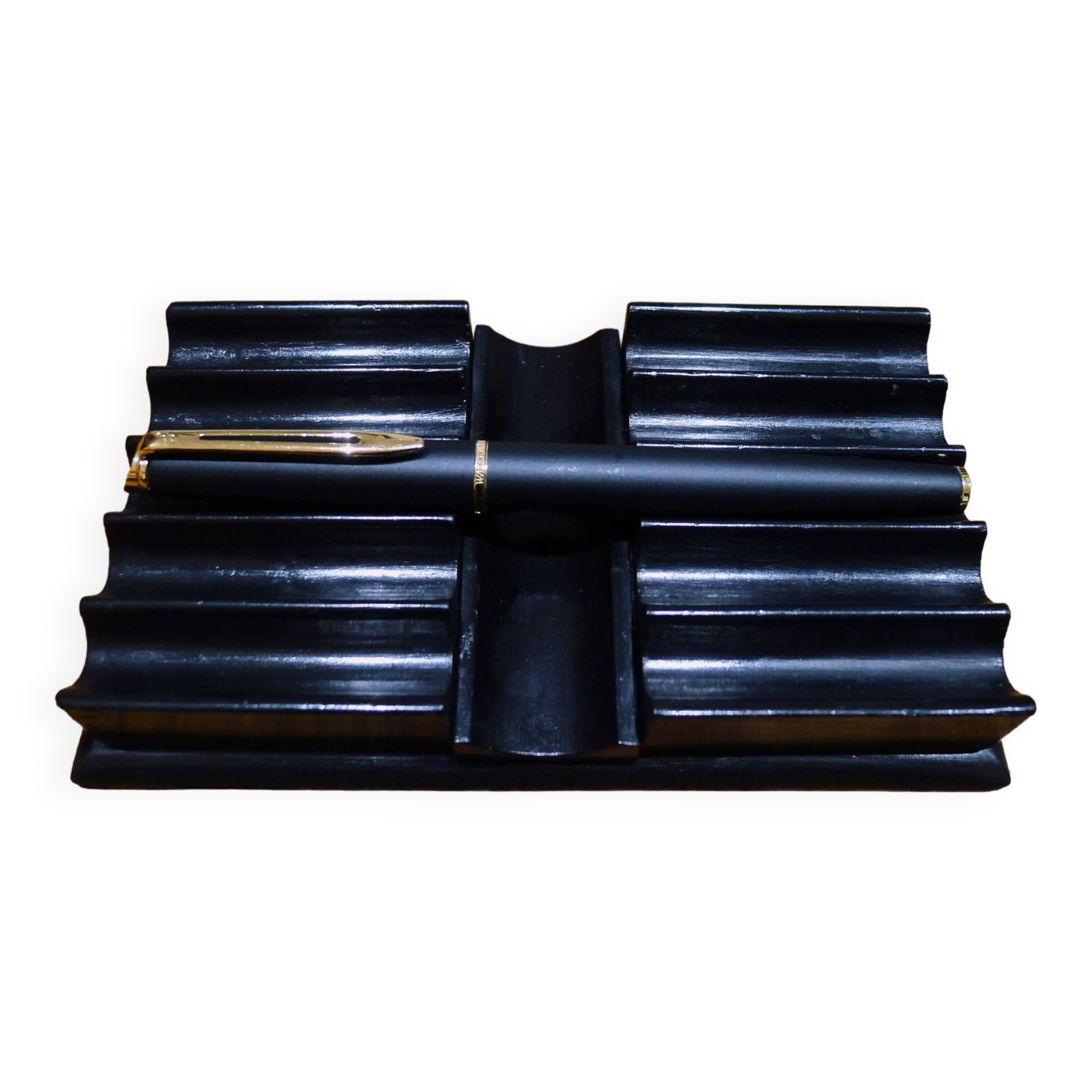 Old pen holder in black wood