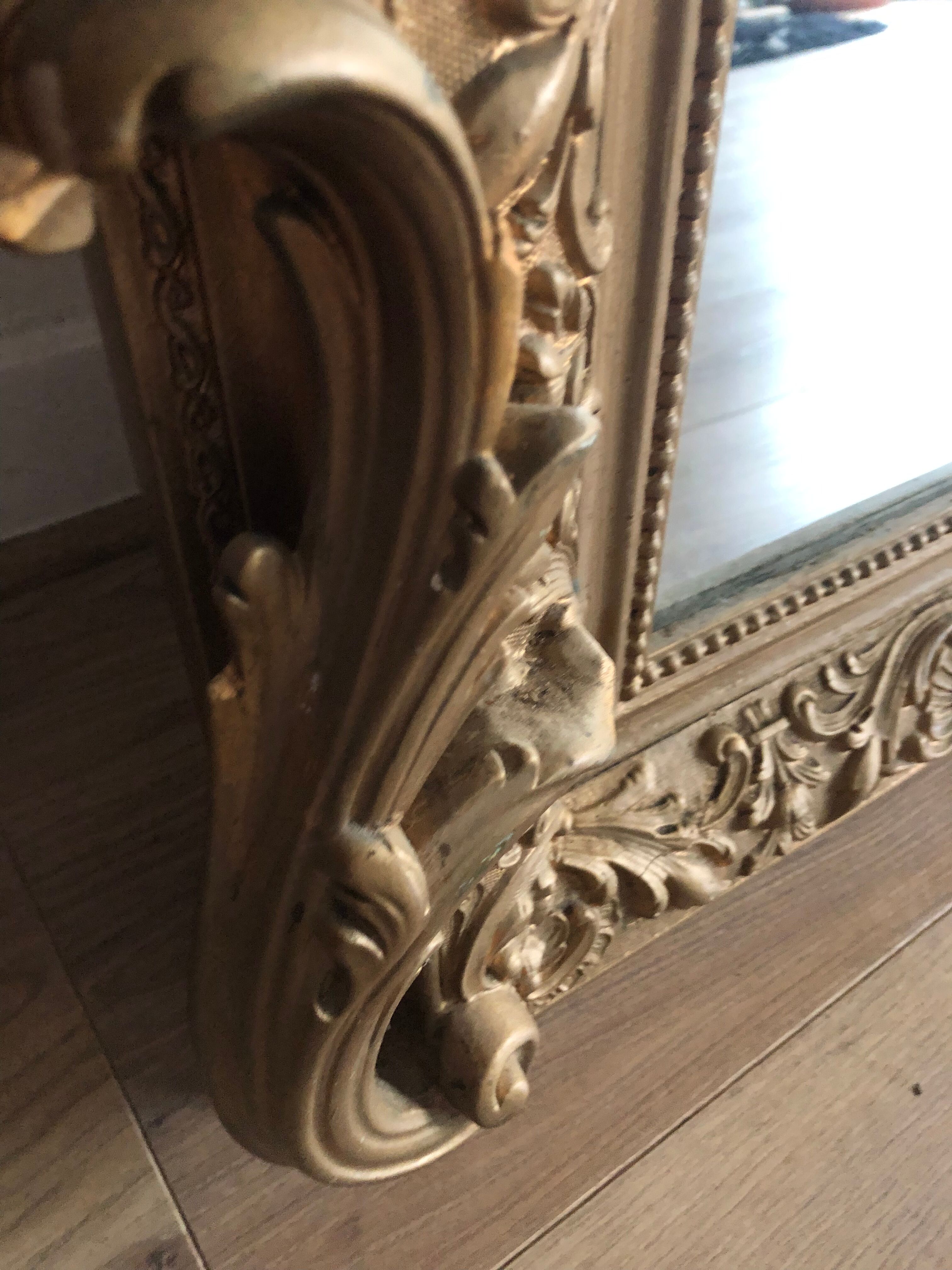 Gilded mirror with pediment XIXth century, 86x136