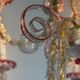 Venetian Rezzonico chandelier in colourless and red Murano glass, circa 1900.