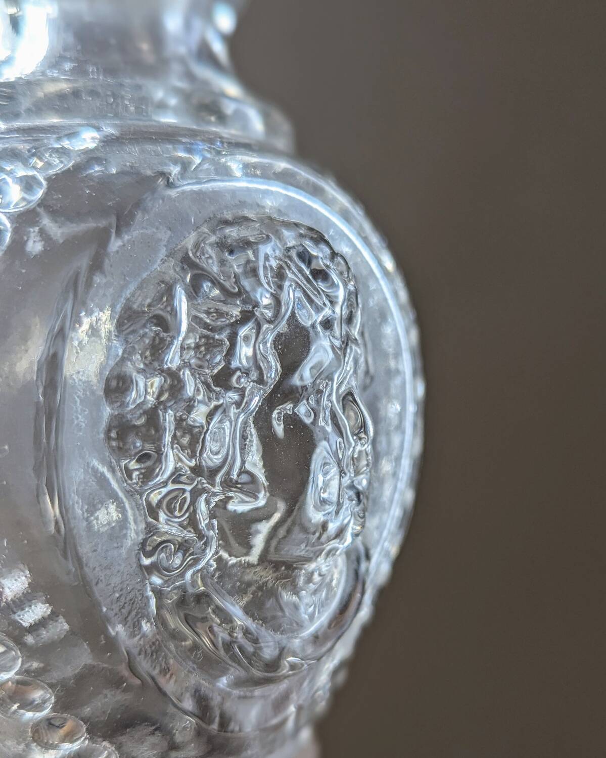 Legras candlestick in molded glass with faces in relief, vintage carafe