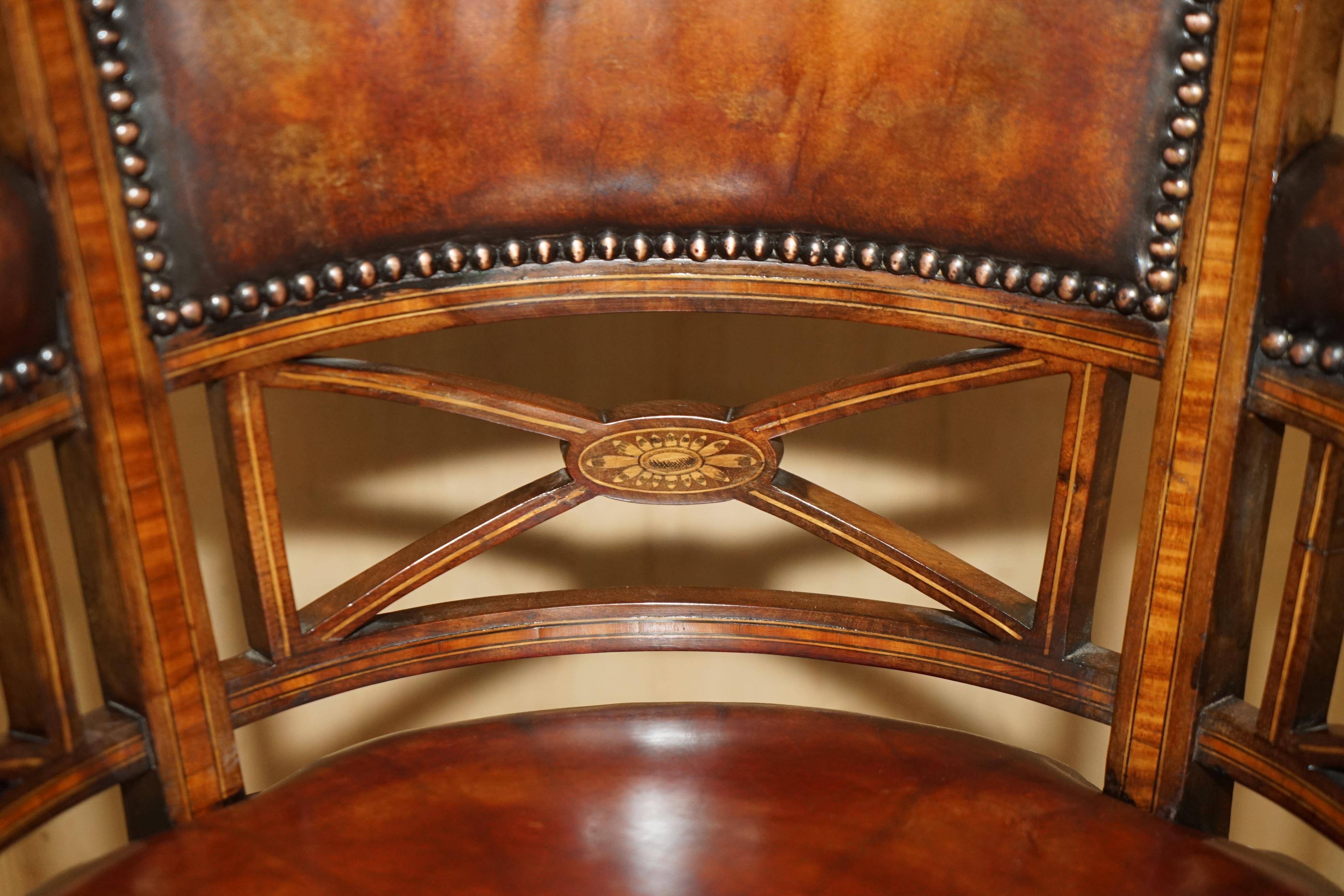Victorian captain's chair in leather restored by Cornelius V Smith.