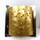 Pair of brutalist wall lights Boréns model 6477 in perforated brass – Sweden