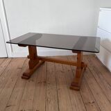 Pine coffee table with smoked glass top.