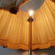 Tripod floor lamp in gilded brass, pleated lampshade, Louis XV style