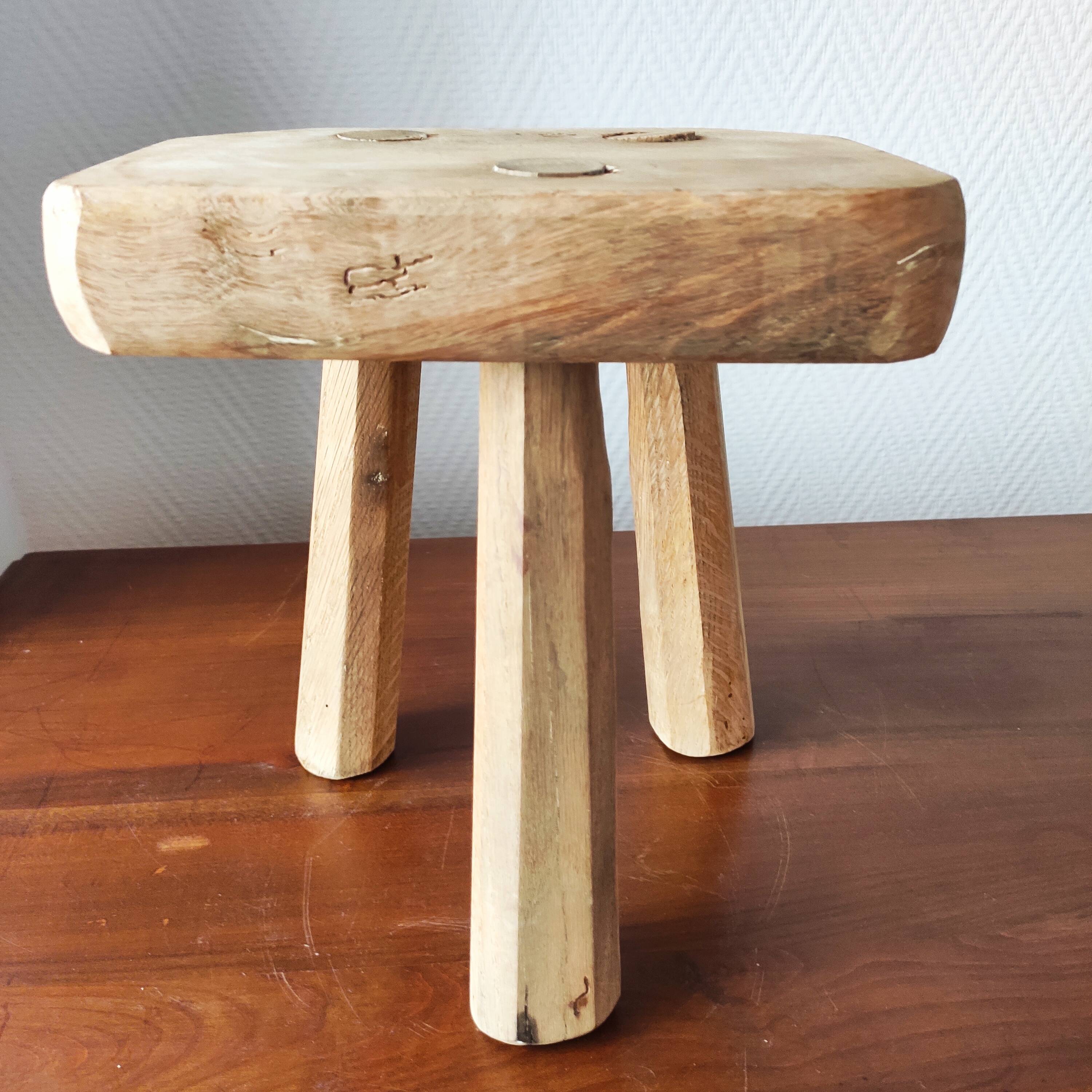 Vintage Danish brutalist tripod stool made of solid oak.