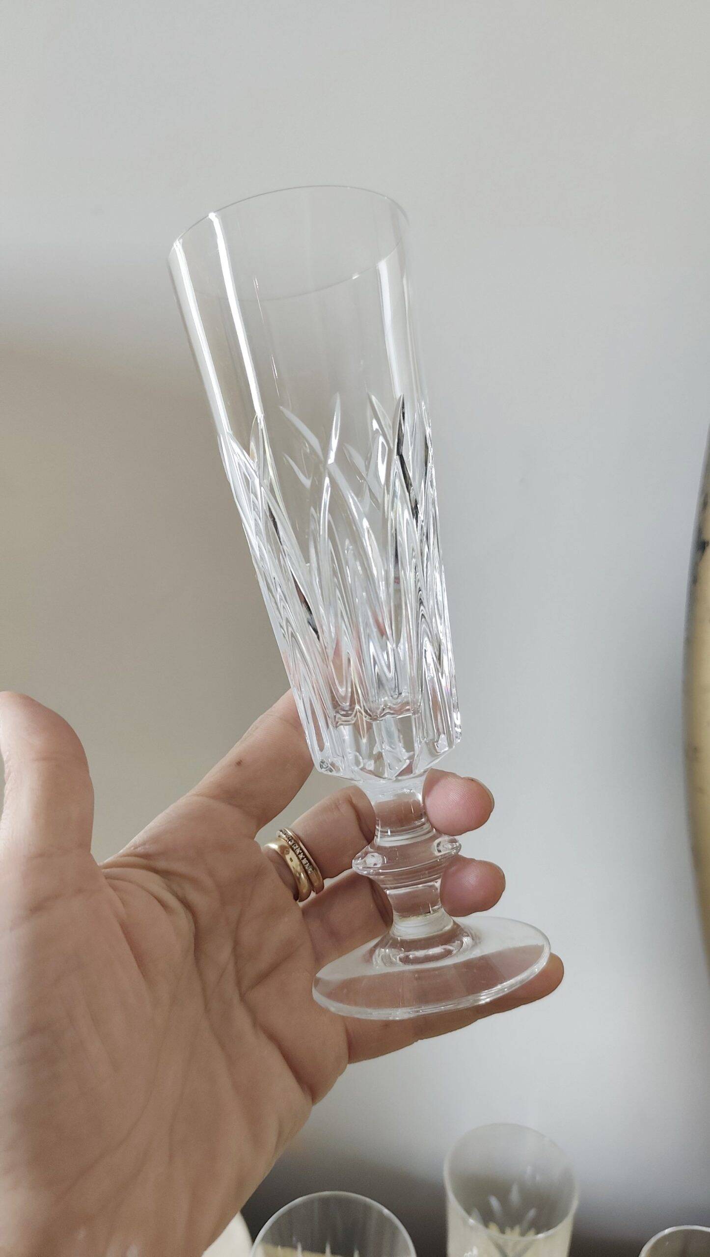 Mismatched set of prestigious crystal champagne flutes
