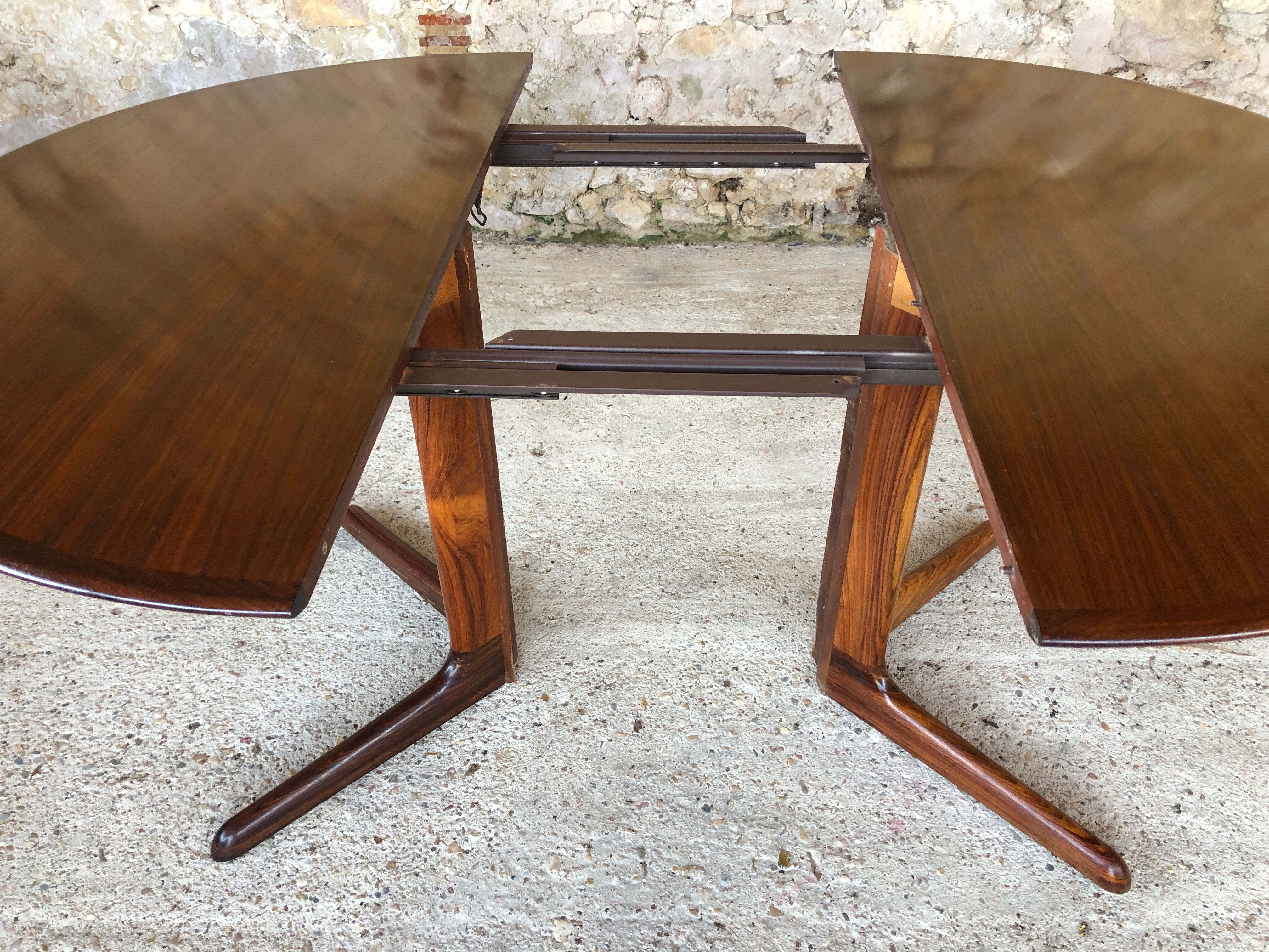 Expandable Scandinavian rosewood dining table by CJ Rosengaarden, circa 60's