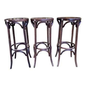 3 curved wooden bar stools