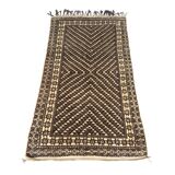 Ancient Berber rug 120x215