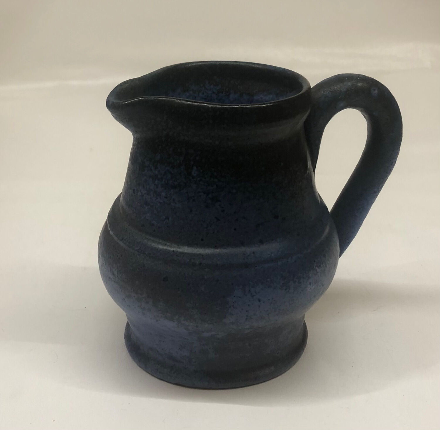 Ceramic pitcher by Roland Tostivint