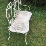 Banquette de jardin ancienne en fer forgé. Vers 1900