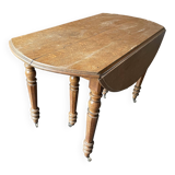 Old wooden table with folding flaps