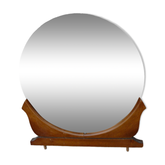 Round mirror on 60's furniture