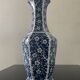 Vintage porcelain vase with white and blue decor