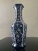Vintage porcelain vase with white and blue decor