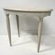 Art Deco style guéridon in patinated beech, 20th century.
