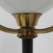 Standing vintage lamp with glass shade and perforated steel shade